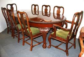 An attractive design with classic full panel leg supports and reinforced wood grain aprons offer additional stability and longevity. Lot Art A Large Mahogany Ball And Claw Foot Extending Wind Out Oval Dining Table Together With Eight Mahogany Matching Chairs Closed L 148cm Wit