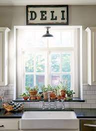 At times, a kitchen window over the sink is the only space in the kitchen where there's room for a window. Pin By Rachael Parmley Zinck On Kitchen Kitchen Window Decor Kitchen Sink Window Kitchen Window Sill