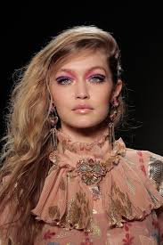 What is teasing your hair? How To Create 80s Hair Without A Perm
