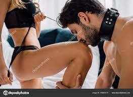 Side View Submissive Man Bdsm Leash Kissing Knee Dominant Woman Stock Photo  by ©VitalikRadko 349524114