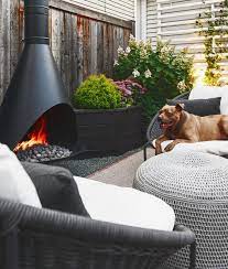Whether you choose an outdoor propane fireplace or one that runs on natural gas will depend on your preference and your home's setup. Our Outdoor Fireplace Farewell Propane Hello Natural Gas Yellow Brick Home