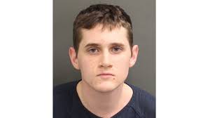 UCF student arrested, had fully automatic AR-15 in vehicle at campus dorm,  police say