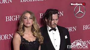 Johnny depp, right, leans over to kiss fiancée amber heard as they attend the red carpet premiere of '3 days to kill' in los angeles on feb. Johnny Depp And Amber Heard On The Red Carpet At The 2016 Palm Springs Film Festival Gala Youtube