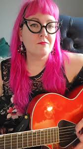 Girl Guitarist Pays Tribute to Rockabilly Roots with 'Bee-Bop-A-Lula'