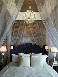 Silvery Sheer Fabric Bed Hangings Make For A Dreamy Boudoir Check Out The Gold And Silver Wallpaper In The Background Canopy Bed Diy Romantic Bedroom Bedroom