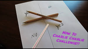 The participants place two pencils, one on top of another, on a piece of paper that has yes and no written upon it. Charlie Charlie Challenge Prank How To Pranks Youtube