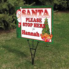 The sign features dimensional, cutout metal letters that display the phrase, santa stop here, down the length of the piece. Personalised Santa Please Stop Here Sign Ref Santastop1 Archer Safety Signs