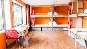 Each individually decorated dormitory room has bunk beds, a toilet and shower. Paris Premium Partners Sandemans New Europe
