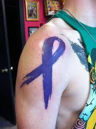 The flowers make the design more visually appealing while highlighting the feminine aspect of the ribbon symbol and breast cancer in general. Crohn S Ribbon I Want This Tattoo For Me And My Sister Cancer Ribbon Tattoos Wrist Tattoos For Guys Tattoos For Guys