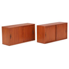 Teak wood that's seasoned well does not shrink or warp but retains its dimensions.this wood remains unaffected by climatic changes. Lot Art Danish Furniture Design A Pair Of Teak Cabinets For Wall Mounting Front With Sliding Doors Behind Which Shelves H 37 W 73 D 24 Cm 2