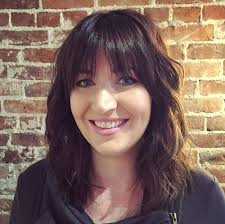 Medium length haircuts are great because they can easily be dressed up or this long hairstyle for women has straight bangs that fall at eyebrow level and are not tapered into the rest of the hair. 40 Universal Shoulder Length Hair With Bangs Ideas