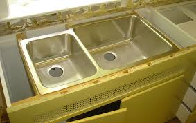 Drop the strainer or coupler into the drain hole and push to compress the putty against the drain opening. How To Install Undermount Kitchen Sinks Concrete Countertop Institute