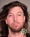 Feds charge 2 for roles in fiery Portland protests