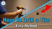 Drilling through porcelain tile is always tricky as these tiles are brittle and require precision and a good machine to make the way through. How To Drill Through Porcelain Tile Easy Mode Youtube