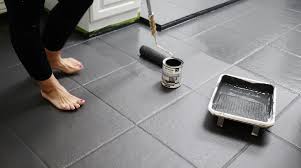 One unless covering a bright colour or heavily patterned tile. How To Paint Tile Flooring With Rust Oleum Floor Coating All Things Thrifty