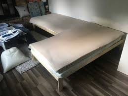 we turned a couple of cheap ikea bed frames into a sectional sofa ikea bed frames ikea bed daybed in living room