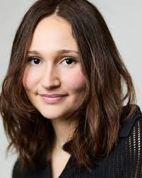 Meet our Team! Name: Olivia Valentini Pronouns: She/her Program: PNB fourth  year 3 words to describe me: Silly, witty, optimistic Fun fact: I'm super  lucky at rolling dice Hot improv take: The