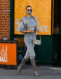 Just looking at these photos. Irina Shayk Struts In Velour Tracksuit By Skims