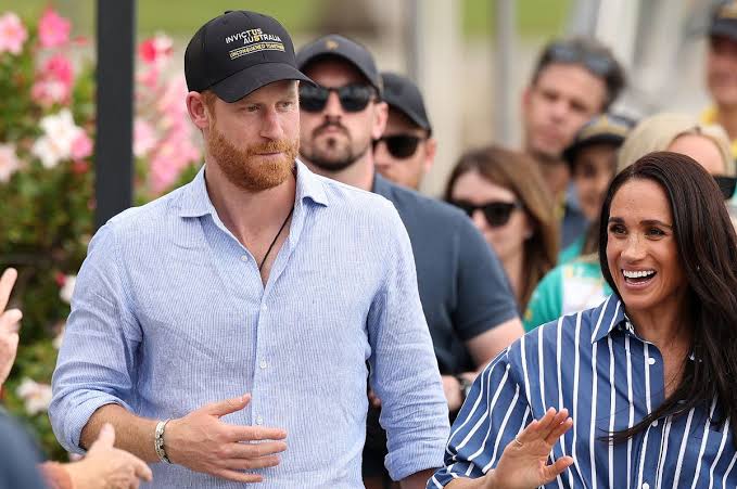 Prince Harry and Meghan Markle 'treated like locals' on first UK outing  together since return - The Mirror