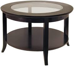 Lower shelf is covered in tightly woven rattan peel. Round Wood Coffee Table With Glass Top Ideas On Foter