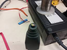 Unplug the power supply from the power point, and then unplug the short cord from the power supply. C The Variable Constant Xbox 360 Power Supply Hack
