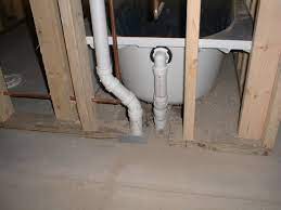 Lift the shower bay out of the way and cut the drainpipe to length. Adding A Tub Or Shower