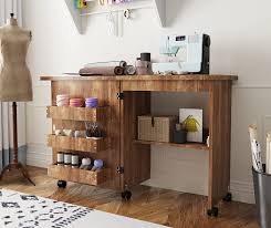 This page is a guide to some of the singer woodwork and treadle stands that has been produced over the years. Buy Sewing Table Folding Sewing Machine Table Sewing Craft Table With Bins Lockable Casters And Adjustable Storage Shelves Multifunctional Sewing Cabinet Art Desk For Small Spaces Sewing Desk Brown Online In Turkey