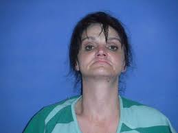 Two charged in drug death