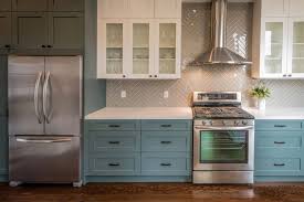 This kitchen with amber toned cabinets and stainless appliances looks fresh and updated. 5 Kitchen Cabinet Colors That Are Big In 2019 3 That Aren T Blog