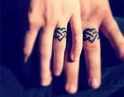 28 Awesome Wedding Band Tattoos Ring Tattoo Designs Ring Tattoos Ring Finger Tattoos
