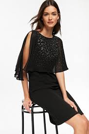 For A Subtle Take On The Animal Print Trend Go For An Updated Lbd Wallis Black Animal Print Overlayer Dress Trending Dresses Dresses Cape Dress