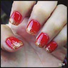 Bright Red With Gold Glitter Tips Red Nails Glitter Bright Red Nails Red And Gold Nails The contrast of bright red looks very striking!