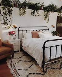 To ensure your black and white boho bedroom still has an airy vibe to it continue to add wooden furniture and decor bright white linens and textiles and lively green plants you can never have enough greenery. How To Give A Black And White Bedroom The Boho Treatment Stue