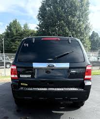 Image result for Tuxedo Black 2011 Escape