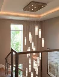 But before you decide, you should consider the height of your ceilings. Large Hanging Entryway Chandelier Lighting A Unique Statement Etsy In 2020 Staircase Chandelier Contemporary Modern Foyer Staircase Chandelier