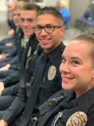 Welcome to the family! Officer Brandon Bains, Officer Lindsy Clemons,  Officer Christopher Cooper, Officer Tiffany Kettering, Officer Robert  Rivera, Officer Whitsitt Shrout, and Officer Gregory Young received their  SPD collar brass this