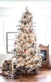Flocked Christmas Tree With A Wood Crate Tree Skirt Funky Junk Interiors Amazing Christmas Trees Flocked Christmas Trees Flocked Christmas Trees Decorated