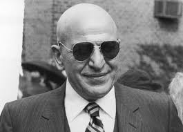 Telly savalas is an actor , who in the 70's i think, played a cop on a show called kojak. Photos Telly Savalas