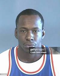 Singer Bobby Brown with his nephew Hakim Johnson , signs an autograph...  News Photo