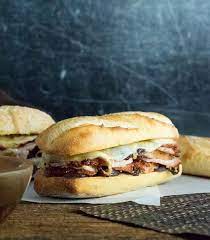 Use a slow cooker to make these saucy pork sandwiches at your next potluck or on game day. Roasted Pork Sandwich Fox Valley Foodie
