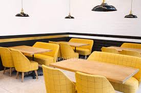 High quality modern & classic french cafe table for your home, bar or luckily, cult furniture offers an extensive collection of classic café tables that will make any. Empty Wooden Tables And Yellow Chairs In Cafe Shop Decoration Stock Photo 189086978