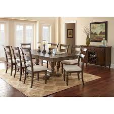 A dining table, seating, and a storage/display piece such as a china cabinet or sideboard. Kaylee 10 Piece Dining Set Dining Room Ambiance Dining Room Furnishings Dining Set