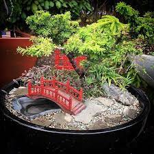 Reasons To Garden In Miniature You Can Make A Little Slice Of Heaven That You Can Call Your Very Ow Miniature Zen Garden Miniature Garden Diy Miniature Garden