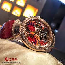 寶格麗divas dream 鳳凰陀飛輪腕錶堪稱集結鐘錶工藝與藝術之大作 優雅迷人的錶殼中蘊藏著纖巧精密的陀飛輪機芯 與細膩手工塗繪微型彩繪的鳳凰及烈焰鏤空錶盤相得益彰 bvlgari bulgari 寶格麗 divasdream