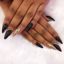 We offer wholesale professional salon nail art products for all categories, with 10 years brand born pretty, born pretty pro, nicole diary, ur sugar, harunouta. Stiletto Nails In Matte Black With Gold Glitter And Swarovskis Black Gold Nails Gold Nails Gold Acrylic Nails