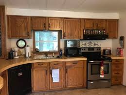 Mobile home cabinets are not solid wood, but a mix of composite materials that include particleboard and plastic veneer. Mobile Home Remodel Before And After Our Re Purposed Home