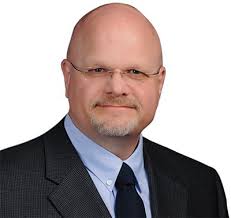 Dr. Stuart Mitchell Biography