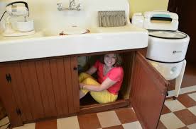 There … a fridge, a cooker and a sink in the kitchen. Inside The Kitchen Of A Christmas Story Movie House Between Naps On The Porch