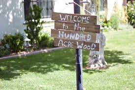 Diy Hundred Acre Wood Sign For A Classic Winnie The Pooh Themed Baby Shower Click Baby Shower Girl Diy Winnie The Pooh Decor Baby Shower Decorations For Boys