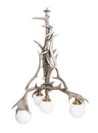 A Caribou Antler Four Light Chandelier The Caribou Ranch And Studio Memorabilia Auction Denver Colorado Chandelier Lighting Antiques Antique Lighting